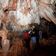 Visitors inside the caves of el choco cabarete