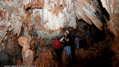 Visitors inside the caves of el choco cabarete