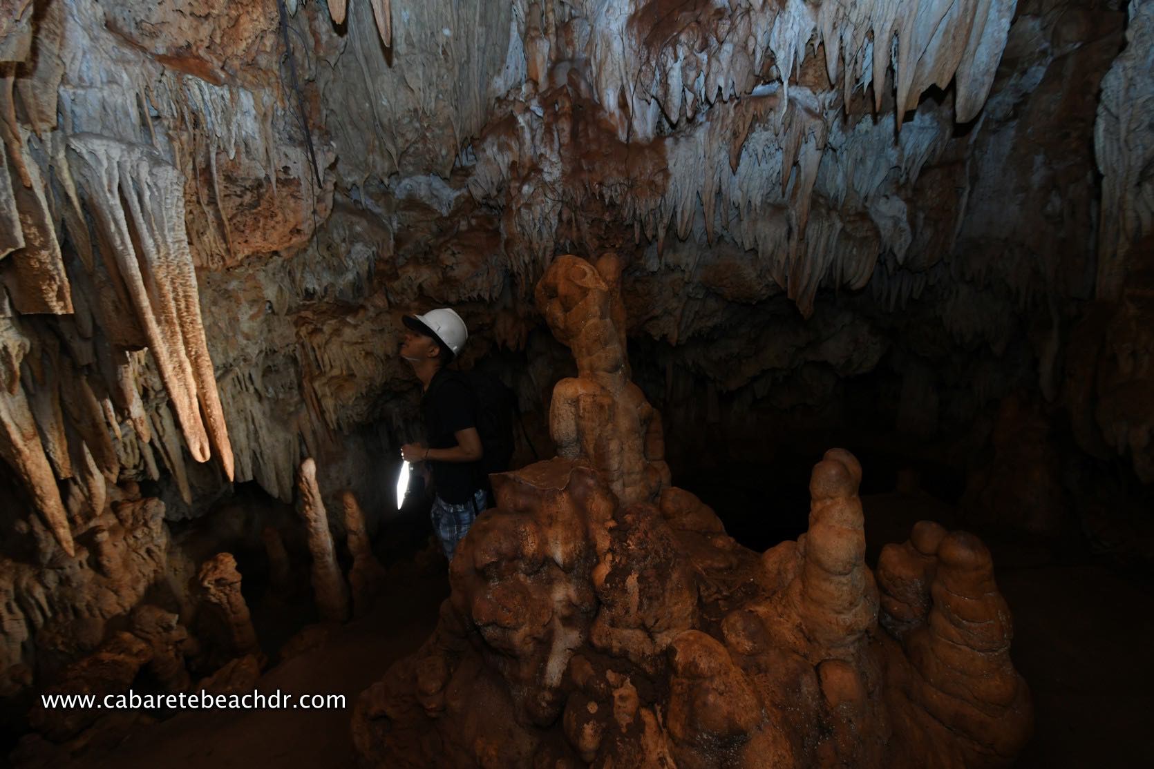 The interior of the cave shows stalagmites
